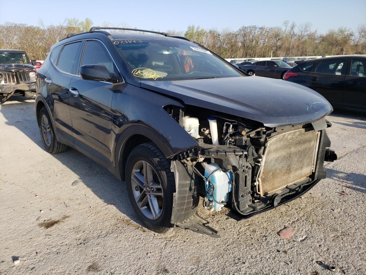 HYUNDAI SANTA FE S 2017 with VIN 5NMZU3LB7HH021143 - Photo from auction