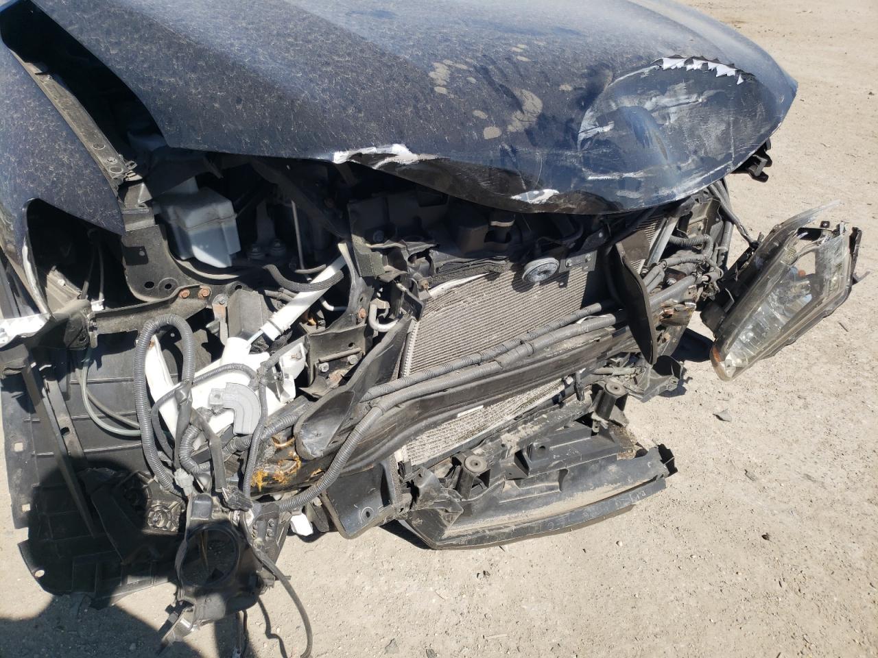 Photo 9 from auction – 2015 NISSAN ROGUE S with VIN 5N1AT2MV5FC767472