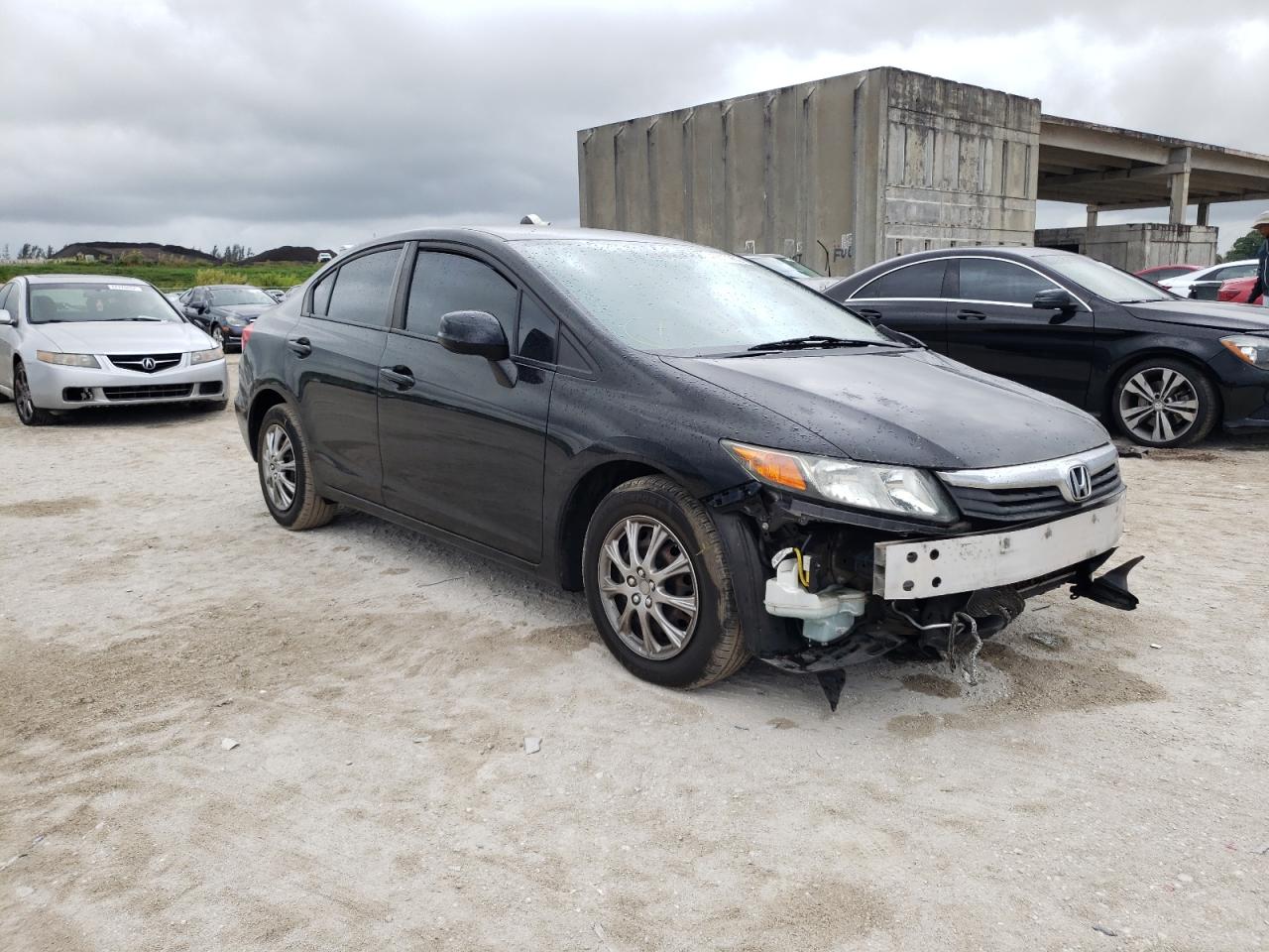 HONDA CIVIC LX 2012 with VIN 19XFB2F59CE040298 - Photo from auction