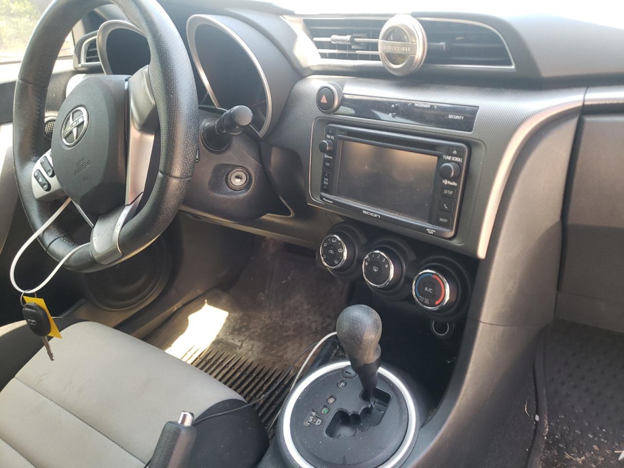 Photo 9 from auction – 2014 TOYOTA SCION TC with VIN JTKJF5C71E3077368