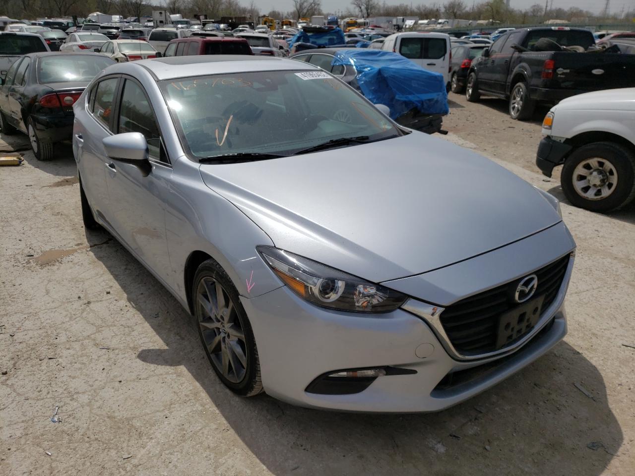 MAZDA 3 TOURING 2018 with VIN 3MZBN1V33JM165703 - Photo from auction
