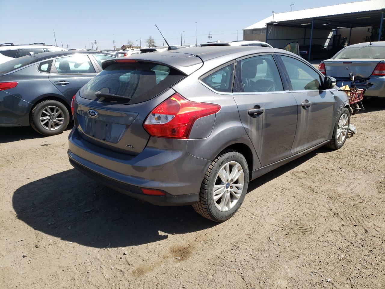 Foto 4 de la subasta – 2012 FORD FOCUS SEL con VIN 1FAHP3M25CL114807