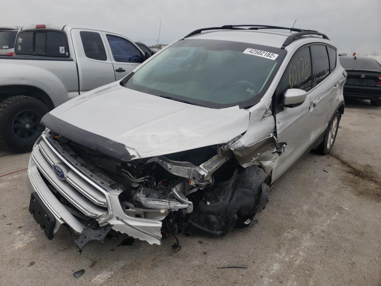 Photo 2 from auction – 2017 FORD ESCAPE SE with VIN 1FMCU9GD1HUC19886