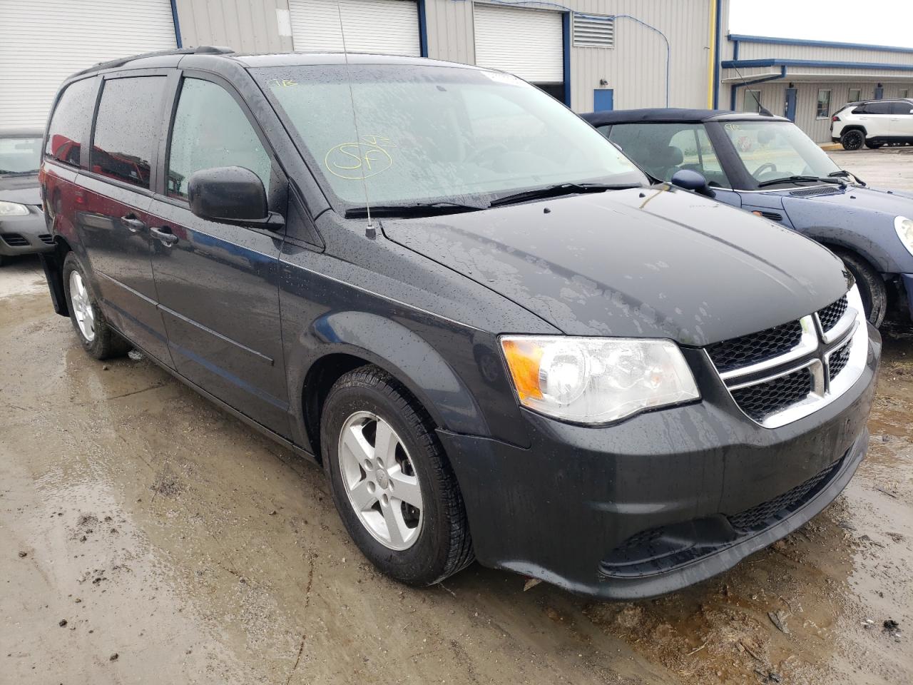 DODGE GRAND CARA 2011 with VIN 2D4RN3DGXBR711105 - Photo from auction
