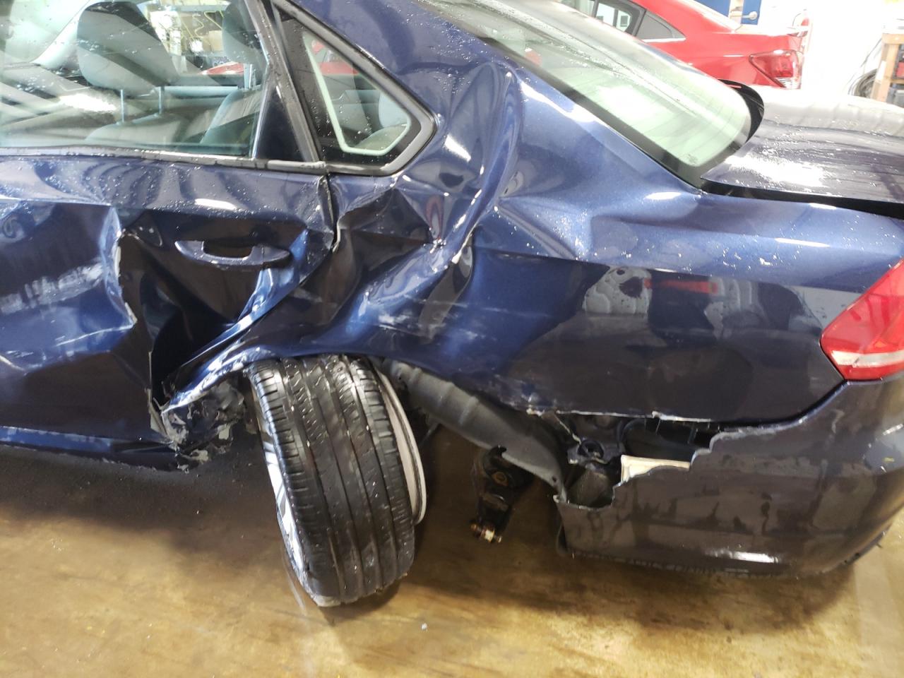 Photo 9 from auction – 2014 VOLKSWAGEN PASSAT S with VIN 1VWAP7A38EC020212