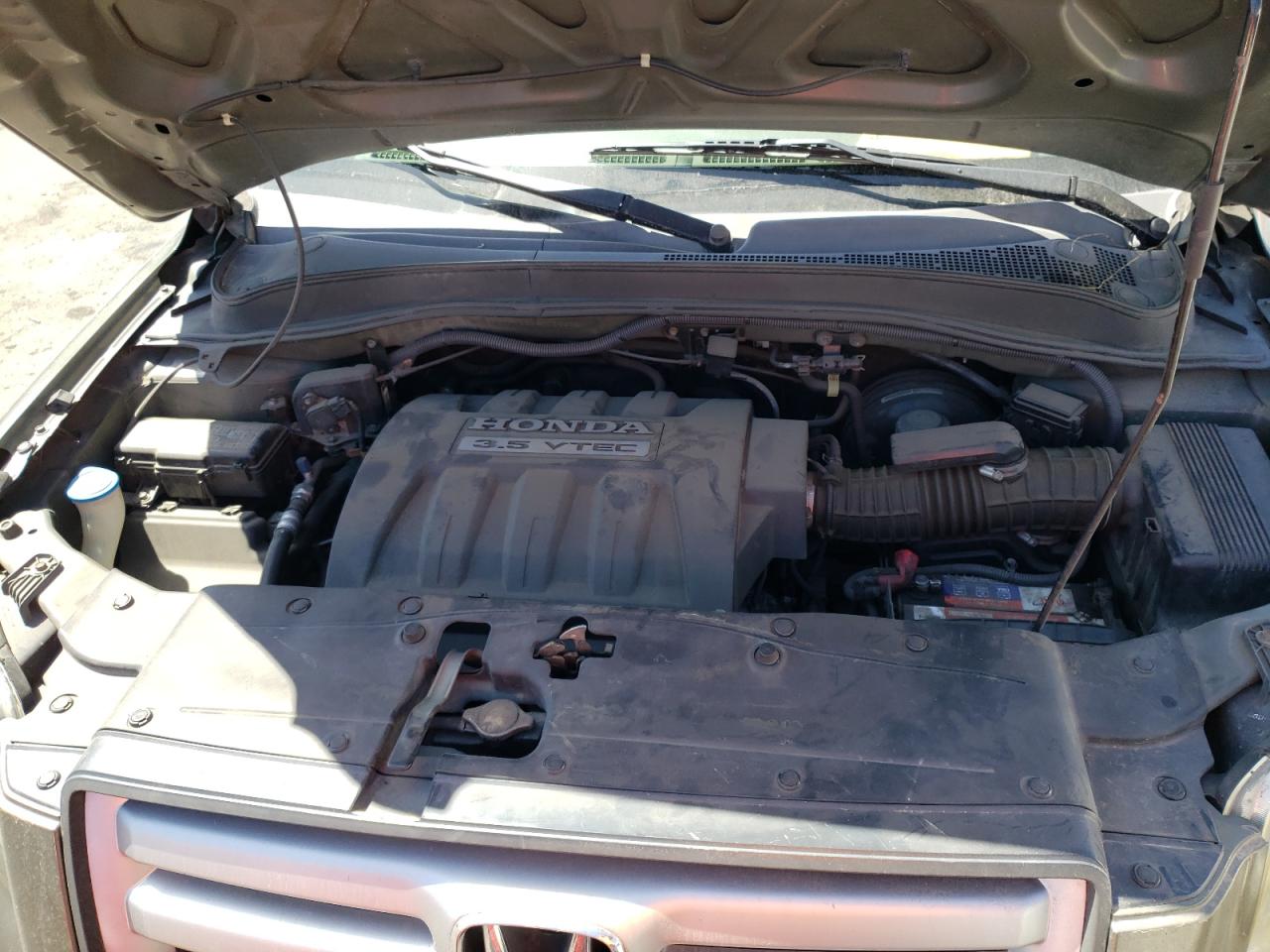 Photo 7 from auction – 2006 HONDA PILOT EX with VIN 5FNYF18506B026373