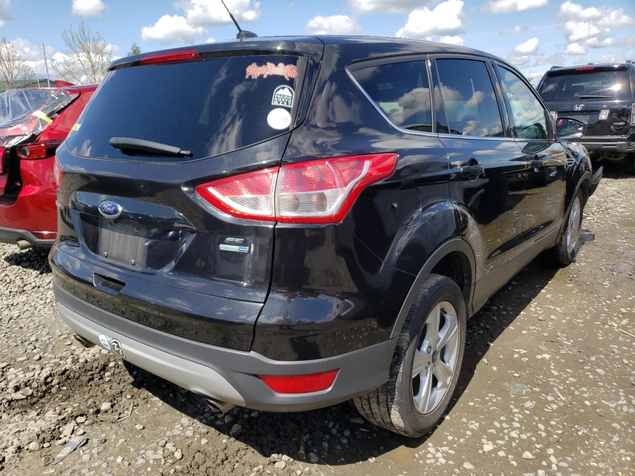 Photo 4 from auction – 2014 FORD ESCAPE SE with VIN 1FMCU9GX4EUE01037