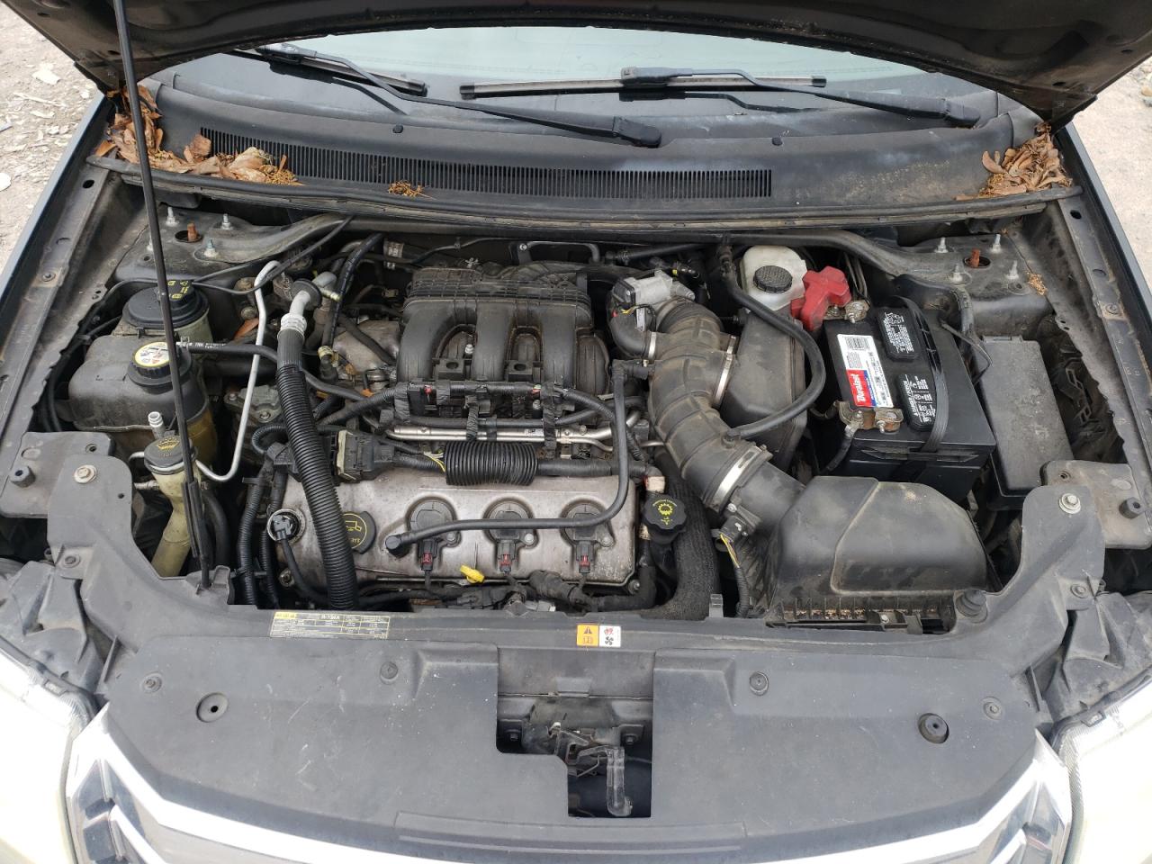 Photo 7 from auction – 2008 FORD TAURUS X E with VIN 1FMDK07W38GA12003