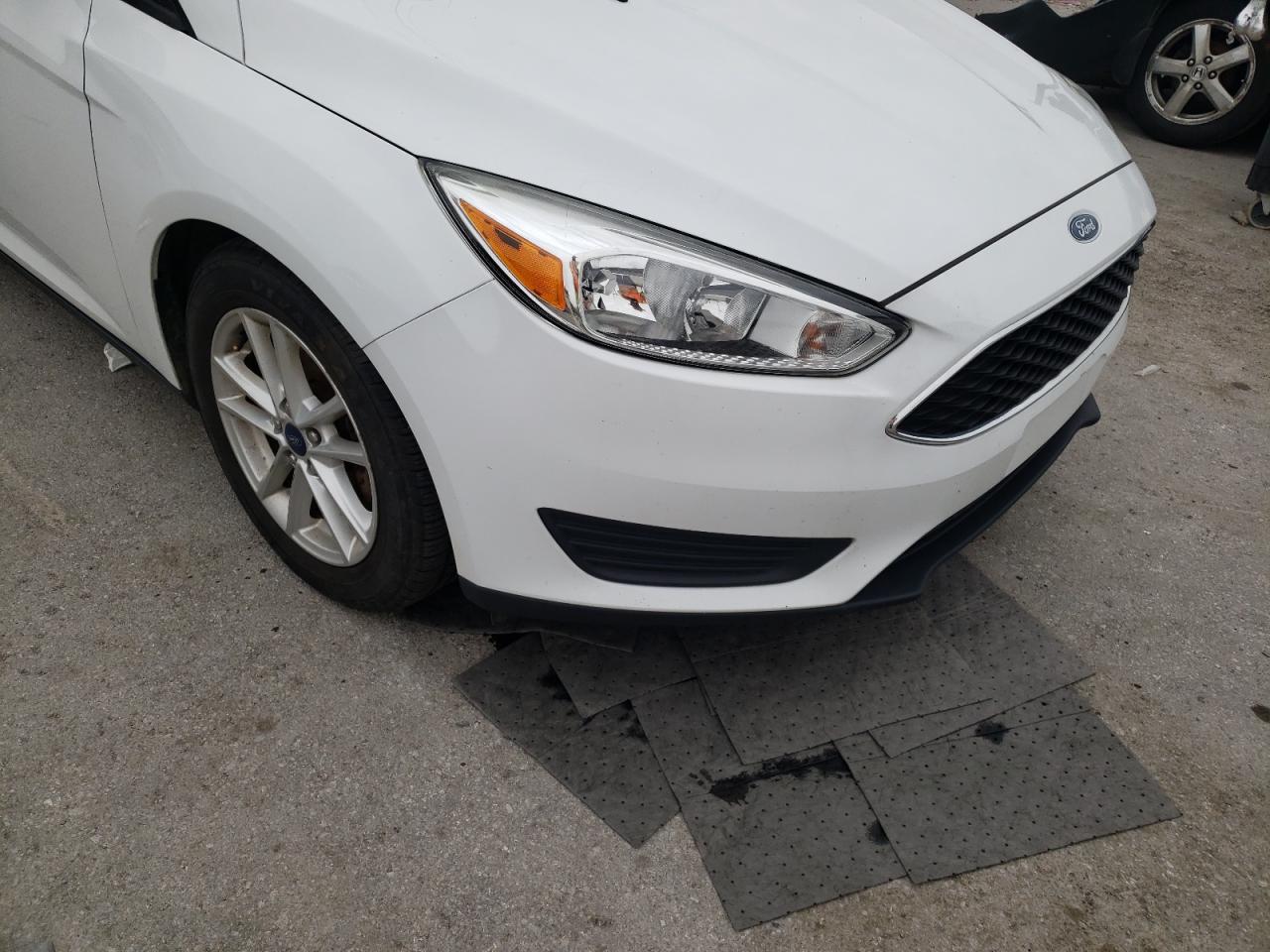 Photo 9 from auction – 2016 FORD FOCUS SE with VIN 1FADP3K22GL337832