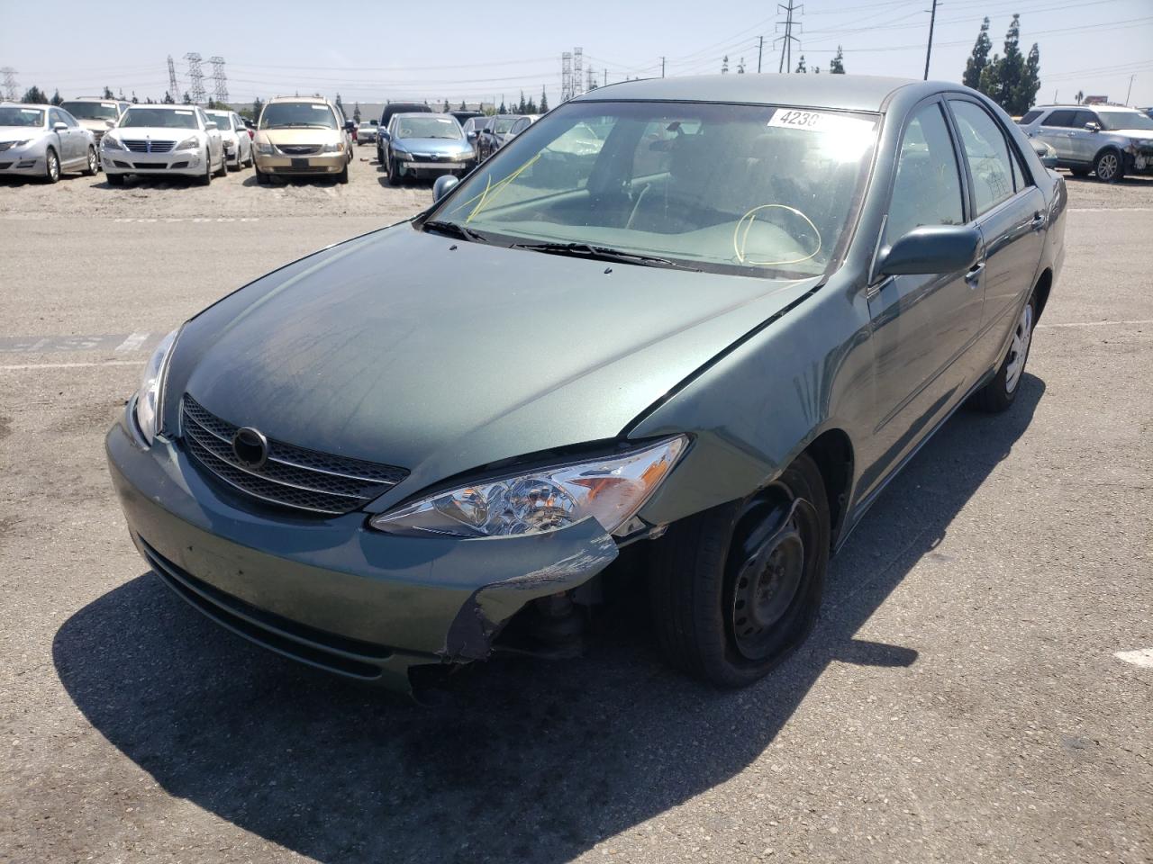 Photo 2 from auction – 2002 TOYOTA CAMRY LE with VIN JTDBE32K220114904