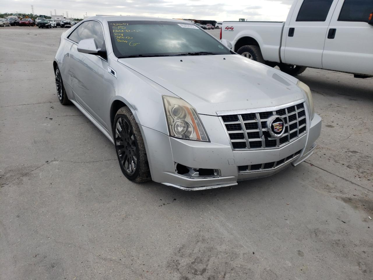 CADILLAC CTS 2014 مع رقم تعريف المركبة 1G6DA1E3XE0104755 - صورة من المزاد