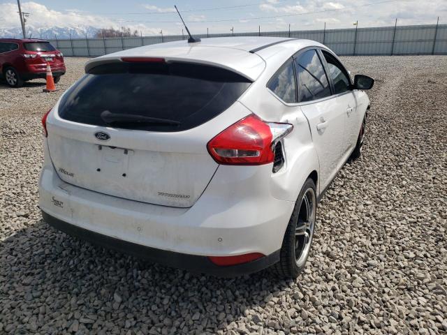 Photo 4 from auction – 2016 FORD FOCUS TITA with VIN 1FADP3N25GL312158