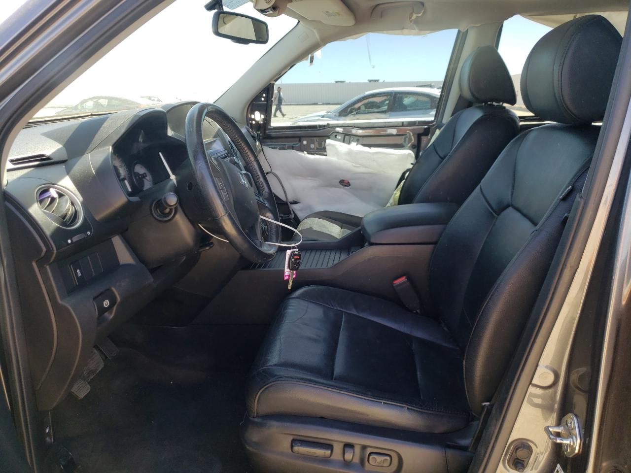 Photo 5 from auction – 2013 HONDA PILOT EXLN with VIN 5FNYF3H73DB038558