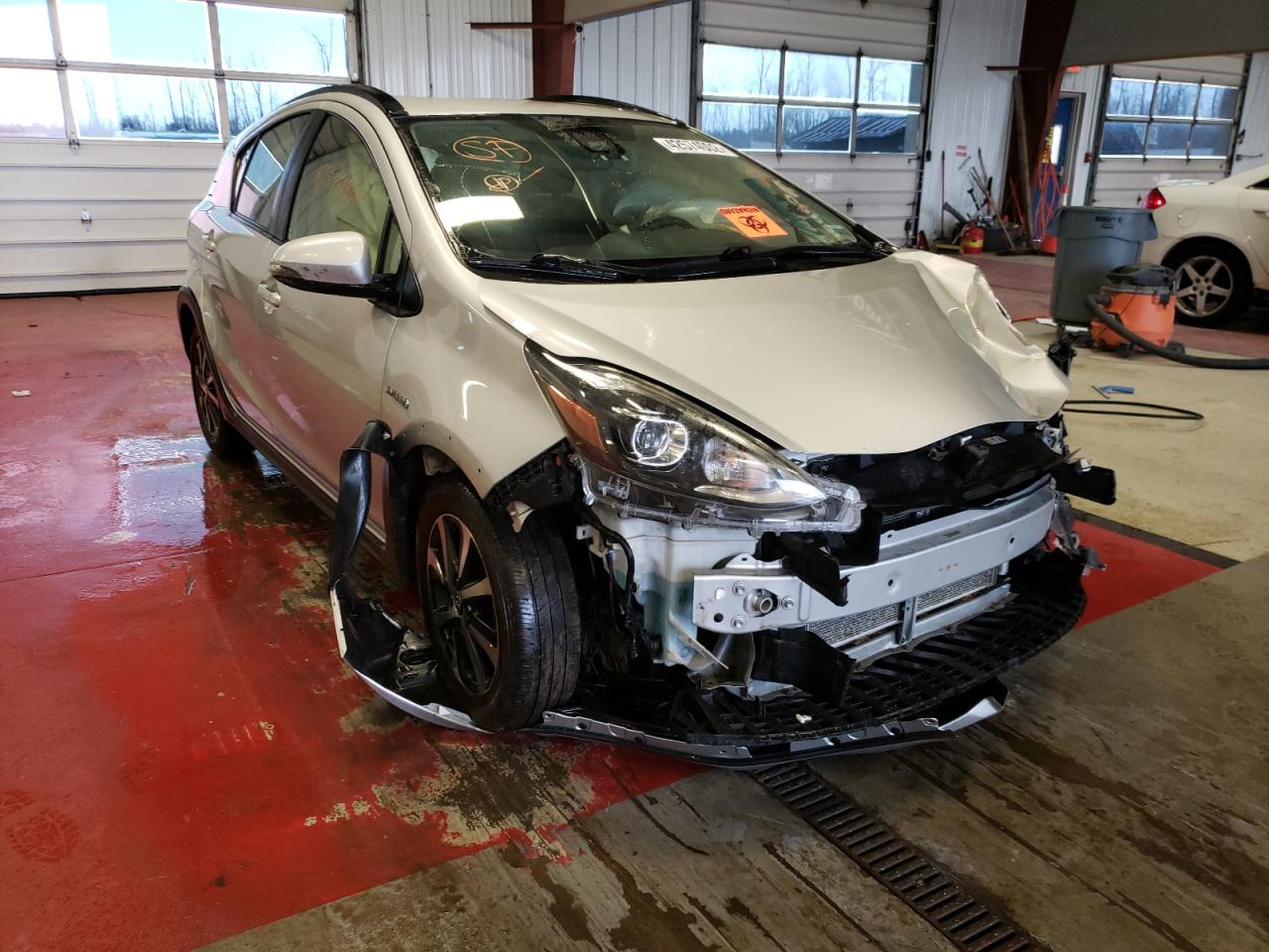 TOYOTA PRIUS C 2018 with VIN JTDKDTB36J1620126 - Photo from auction