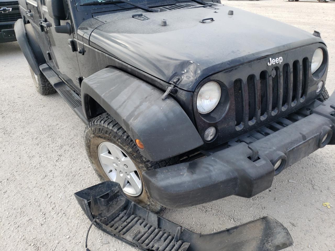 Photo 9 from auction – 2014 JEEP WRANGLER U with VIN 1C4BJWDG2EL151461