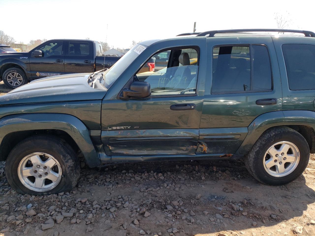 Photo 9 from auction – 2003 JEEP LIBERTY LI with VIN 1J8GL58K53W650820