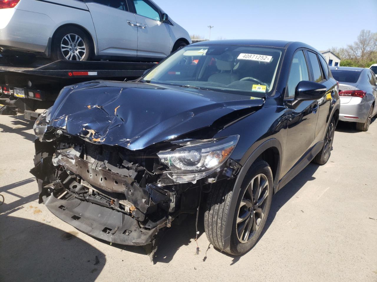 Photo 2 from auction – 2016 MAZDA CX-5 GT with VIN JM3KE4DY2G0857262