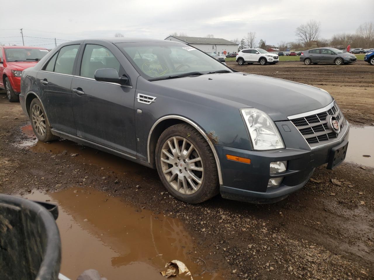 CADILLAC STS 2009 with VIN 1G6DD67V590136313 - Photo from auction