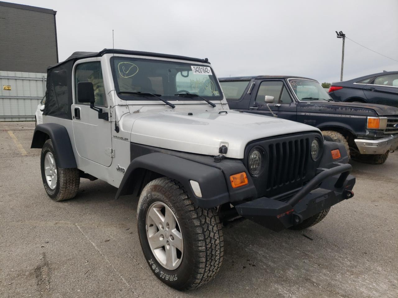 JEEP WRANGLER / 2002 with VIN 1J4FA39S72P748214 - Photo from auction