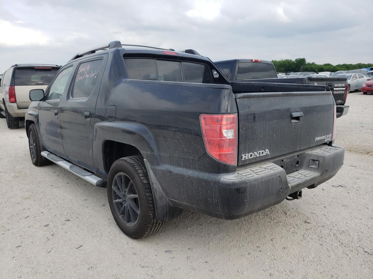 Photo 3 from auction – 2011 HONDA RIDGELINE with VIN 5FPYK1F59BB001634