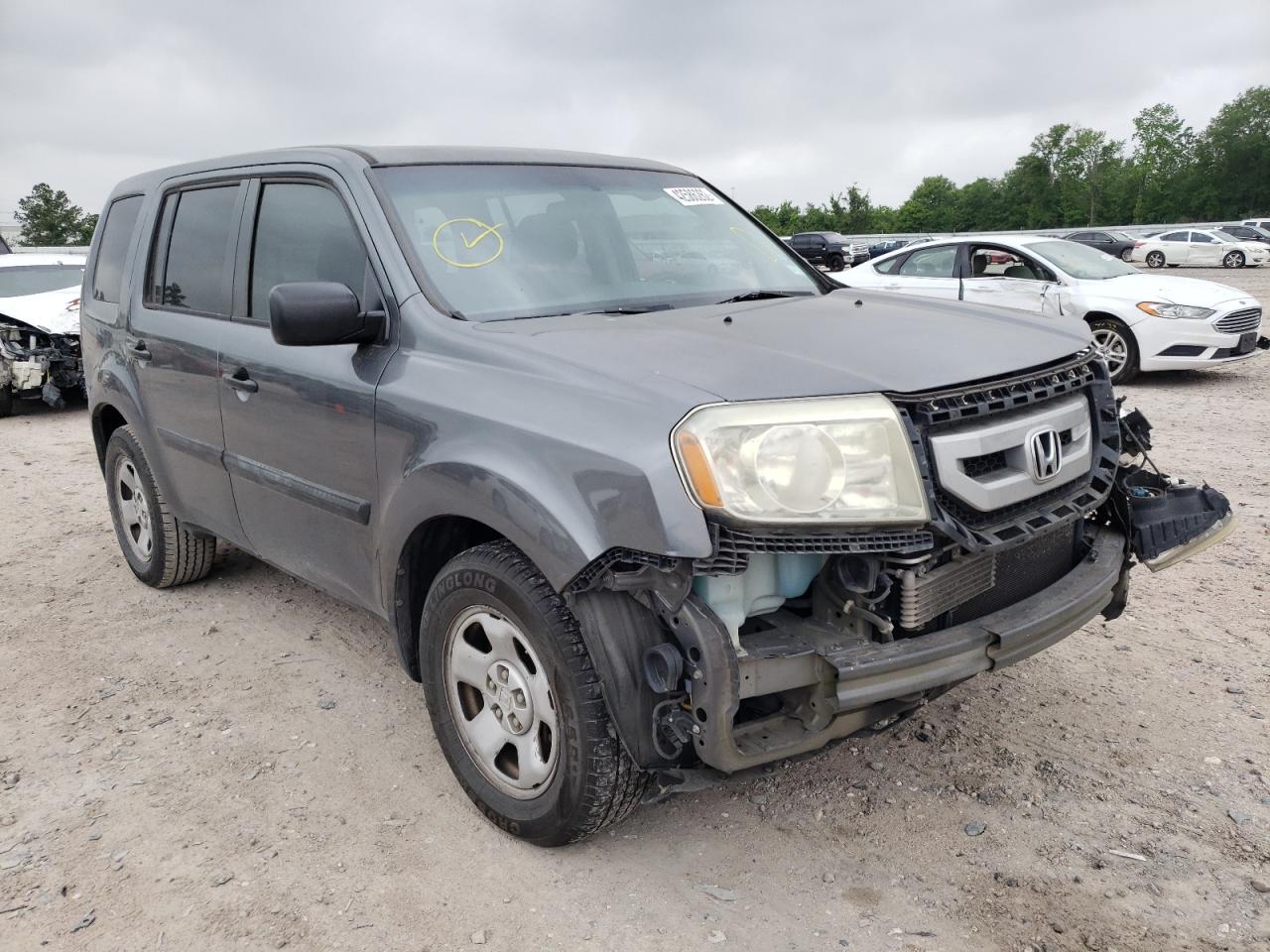 HONDA PILOT LX 2011 with VIN 5FNYF3H2XBB053074 - Photo from auction