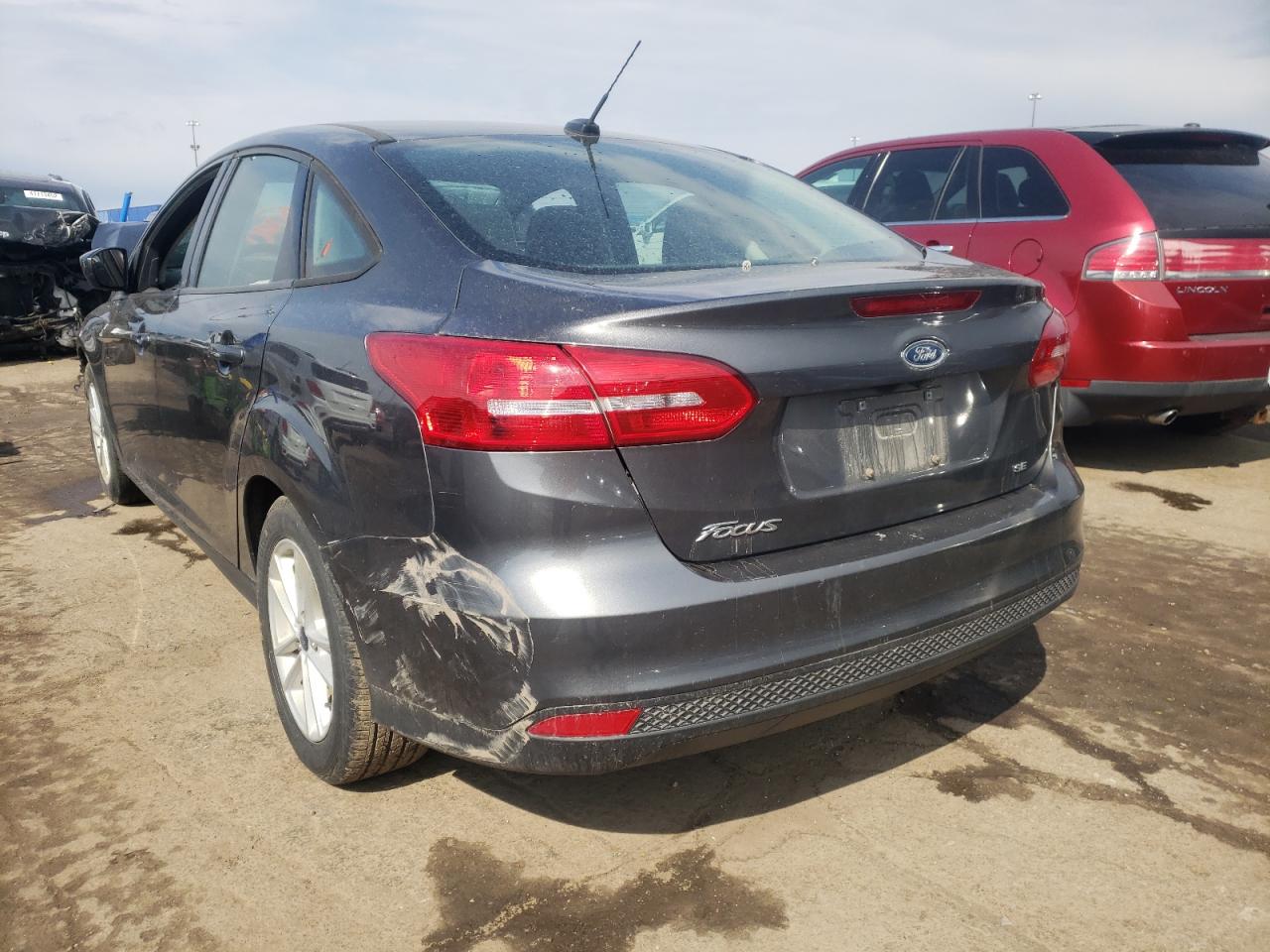 Photo 3 from auction – 2018 FORD FOCUS SE with VIN 1FADP3F2XJL229010