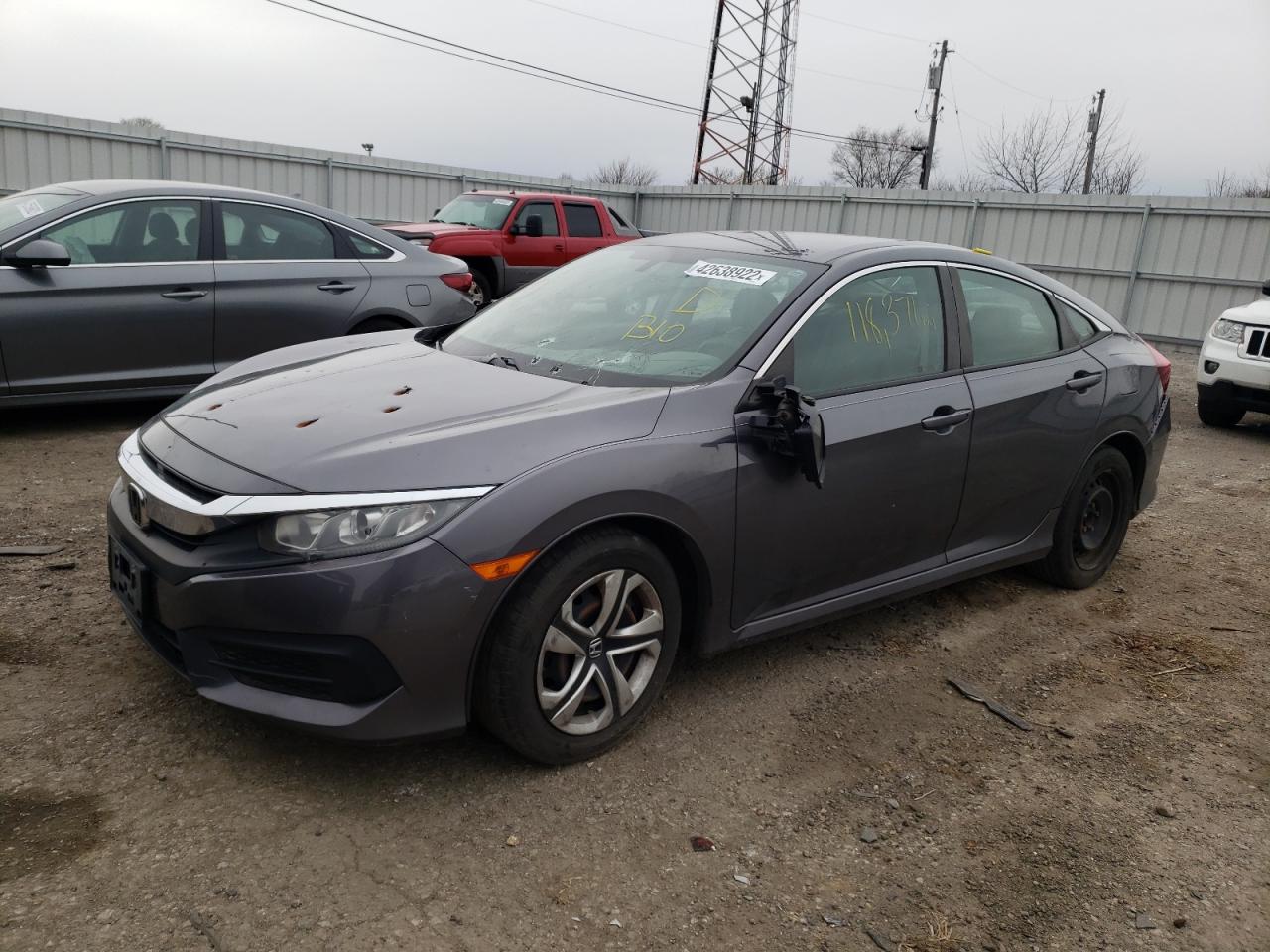 Photo 2 from auction – 2017 HONDA CIVIC LX with VIN 19XFC2F5XHE036135