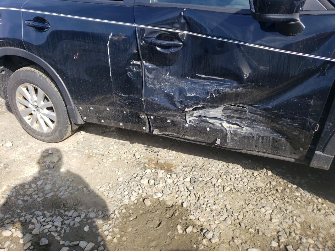 Photo 9 from auction – 2014 MAZDA CX-5 SPORT with VIN JM3KE2BE7E0363960