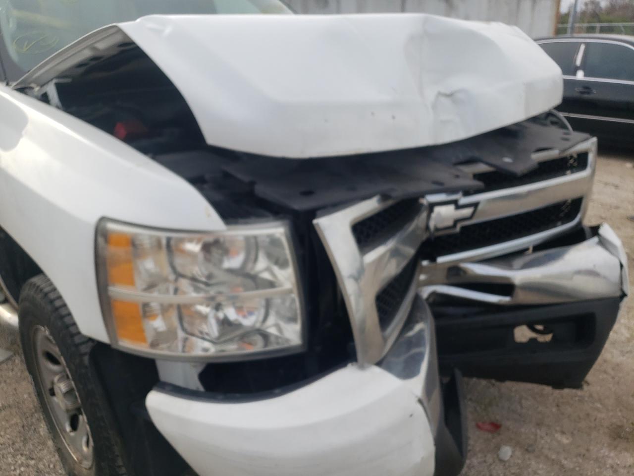 Photo 9 from auction – 2011 CHEVROLET SILVERADO with VIN 1GCRKREA1BZ102459