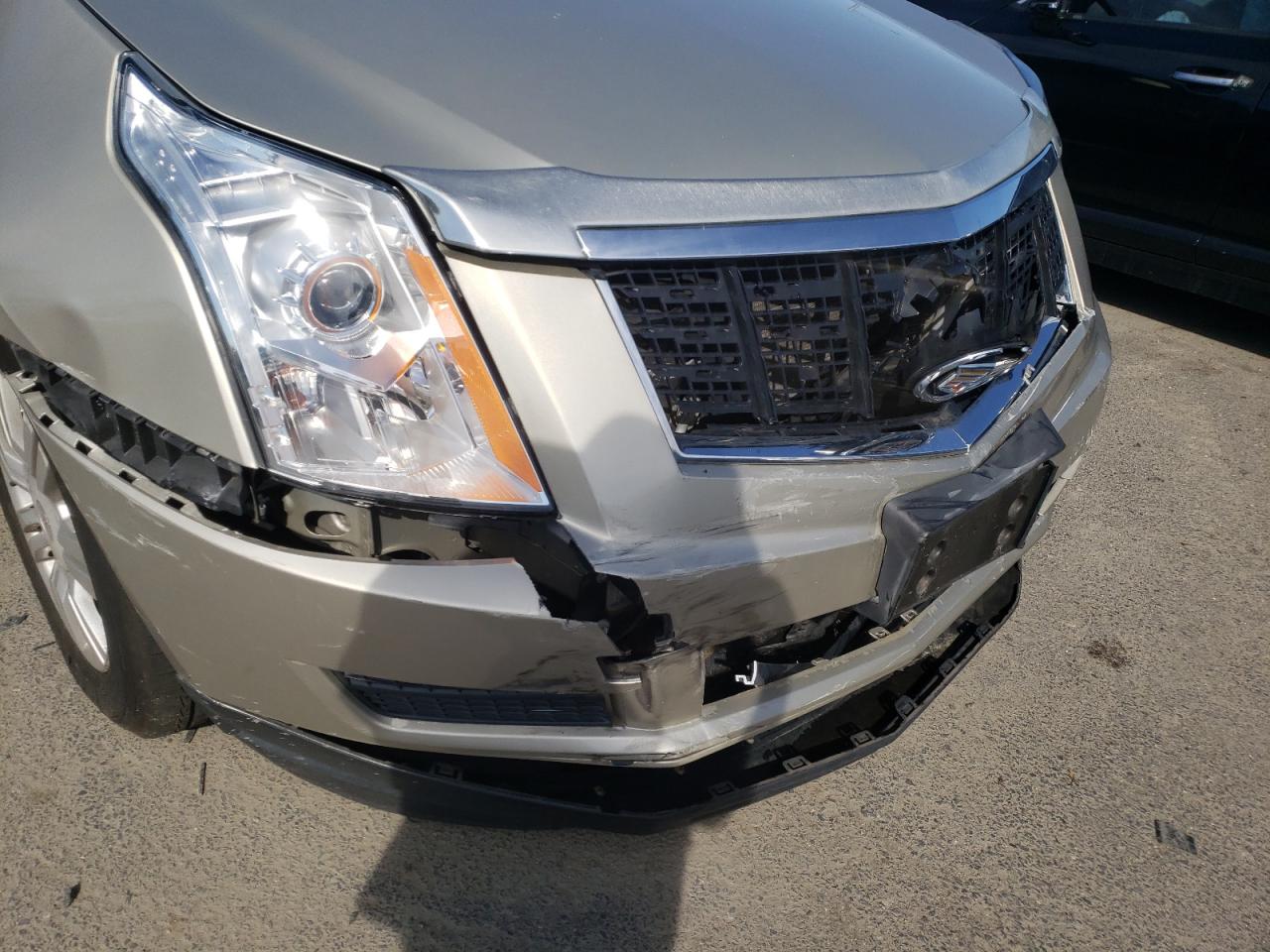 Photo 9 from auction – 2013 CADILLAC SRX with VIN 3GYFNAE38DS550074