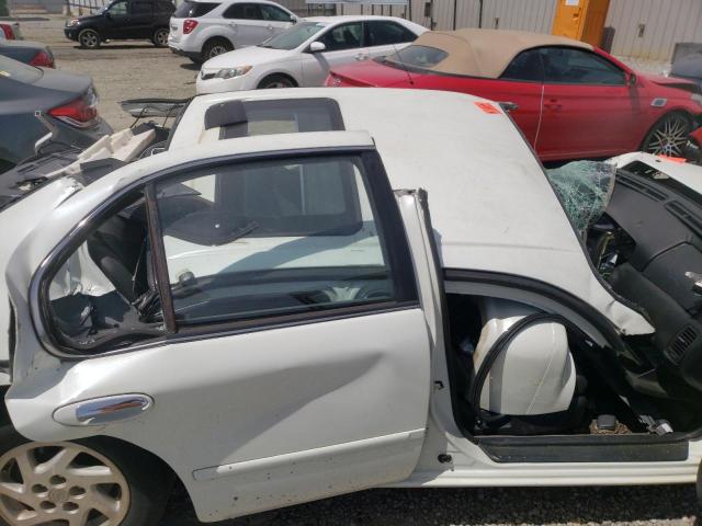 Photo 9 from auction – 1999 NISSAN MAXIMA GLE with VIN JN1CA21D9XT812657