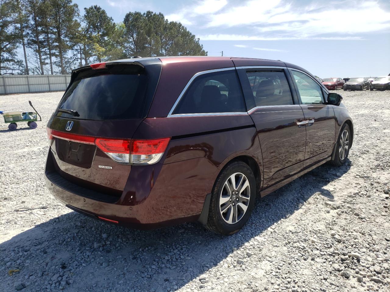 Photo 4 from auction – 2014 HONDA ODYSSEY TO with VIN 5FNRL5H99EB135095