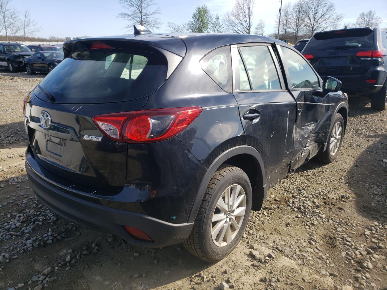 Photo 4 from auction – 2014 MAZDA CX-5 SPORT with VIN JM3KE2BE7E0363960