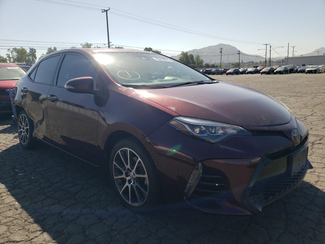 TOYOTA COROLLA L 2017 with VIN 5YFBURHE1HP577283 - Photo from auction