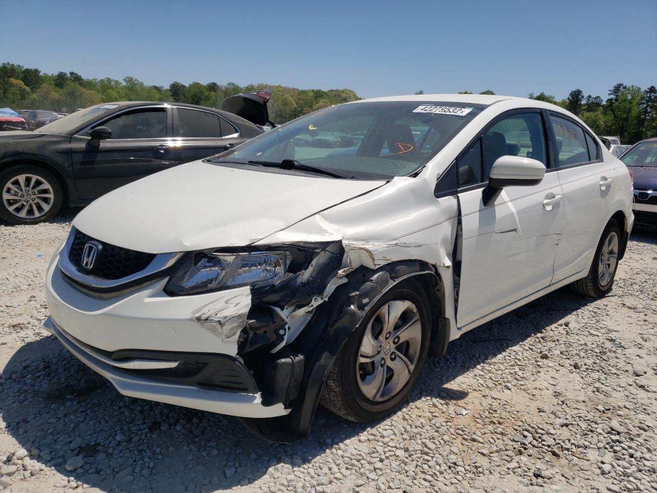 Photo 2 from auction – 2014 HONDA CIVIC LX with VIN 19XFB2F54EE024688