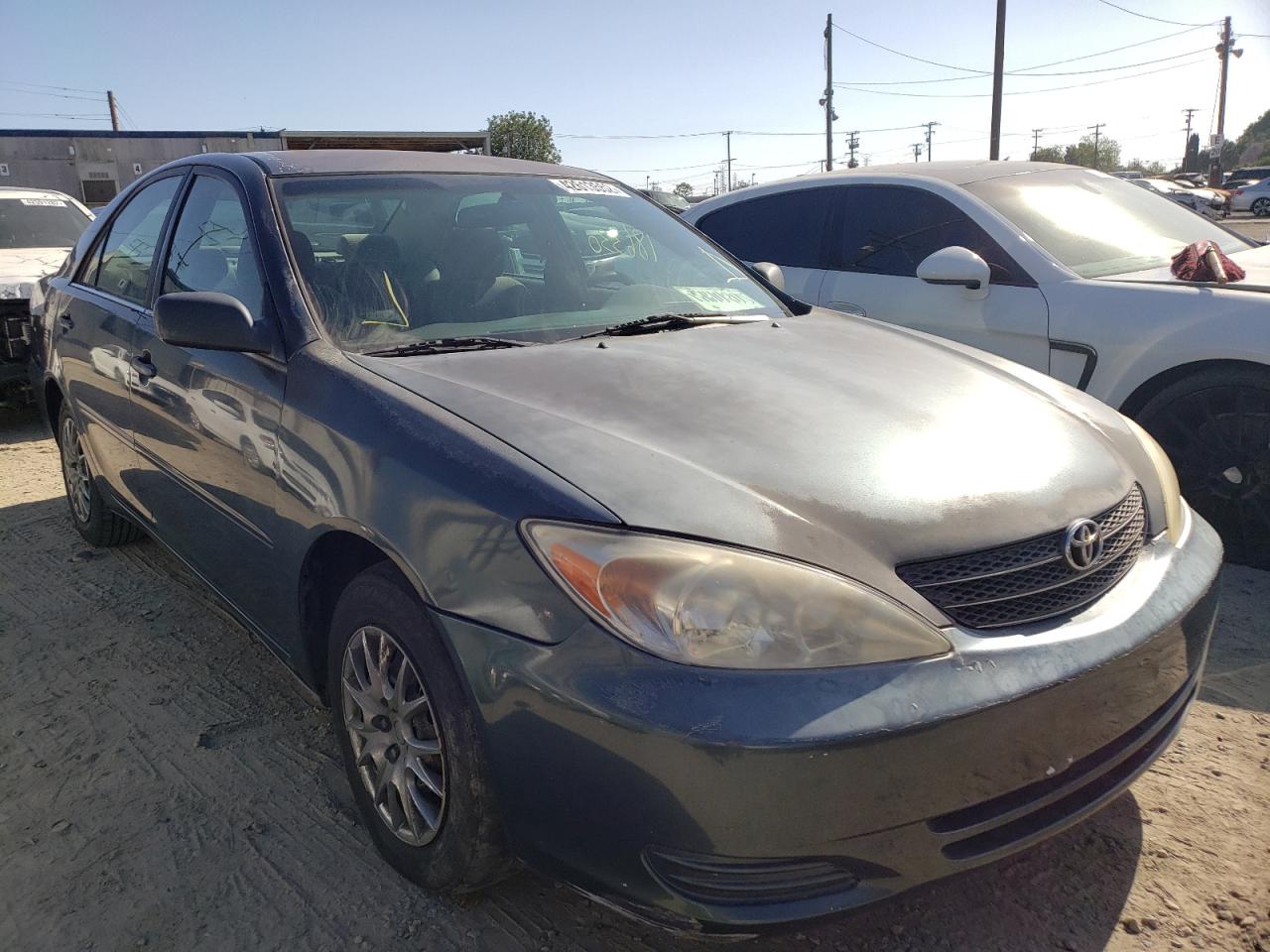 TOYOTA CAMRY LE 2002 with VIN 4T1BE32K82U580650 - Photo from auction