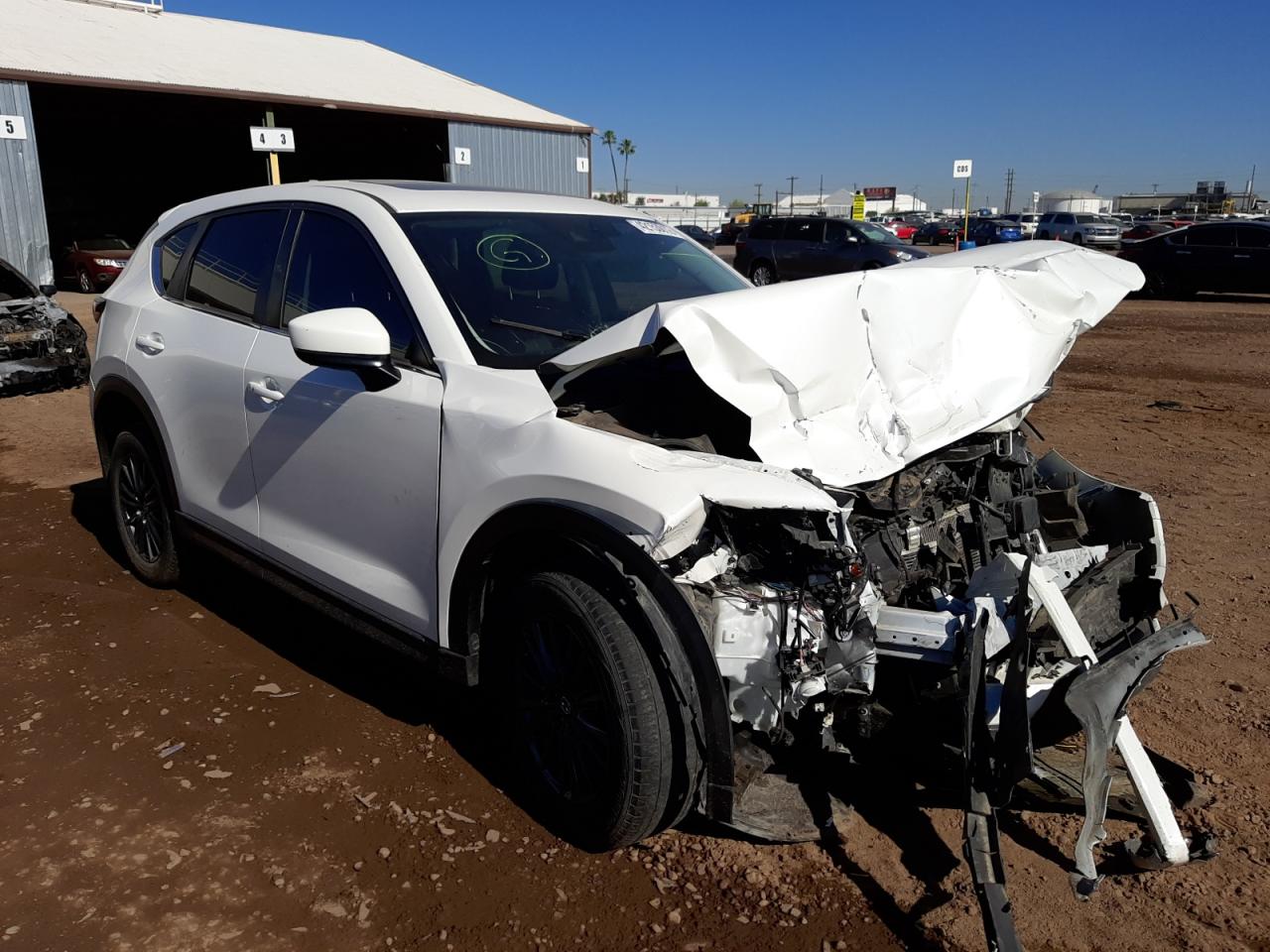 MAZDA CX-5 TOURI 2019 with VIN JM3KFACM3K1558120 - Photo from auction