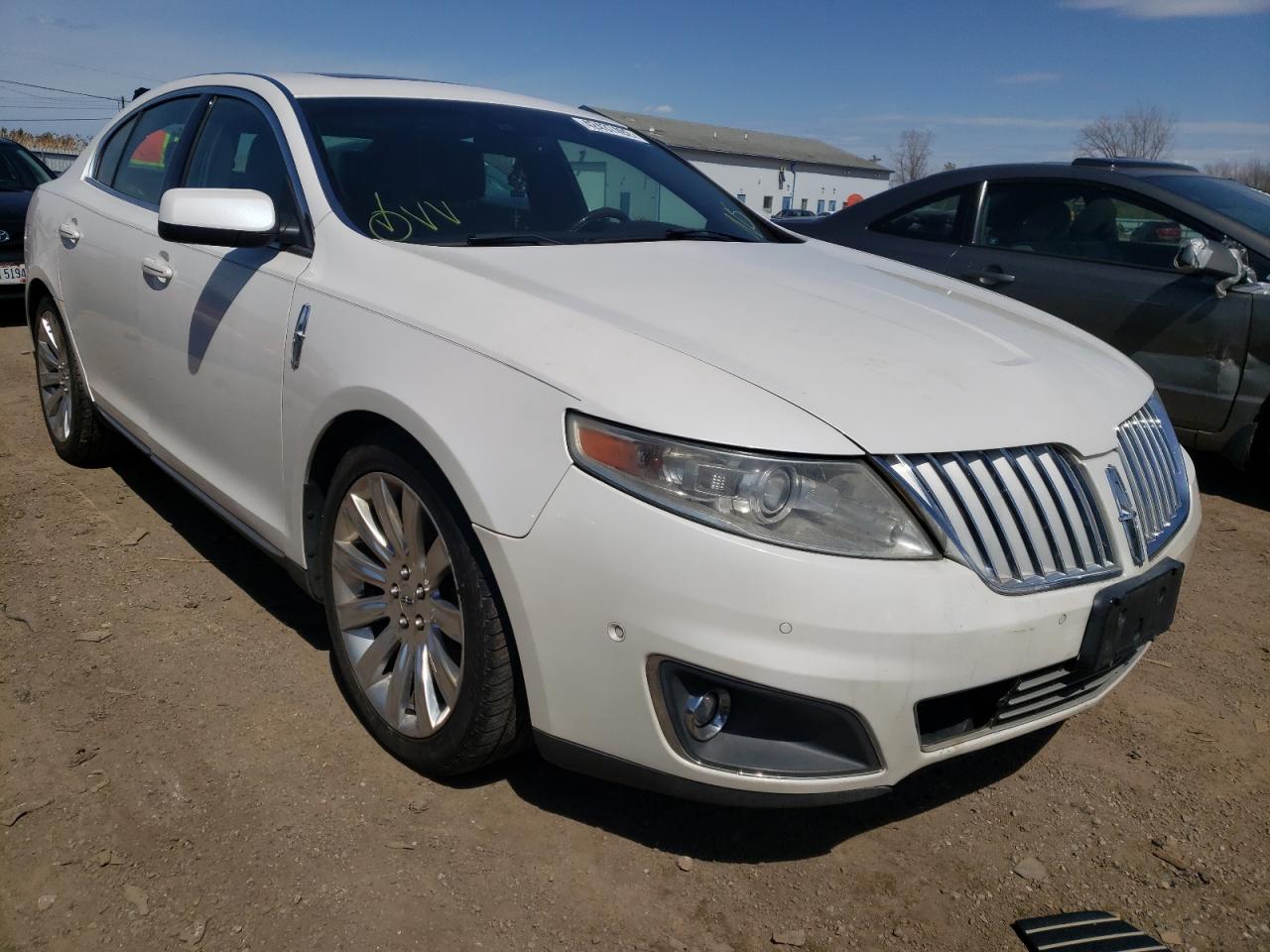 LINCOLN MKS 2011 with VIN 1LNHL9FTXBG607691 - Photo from auction