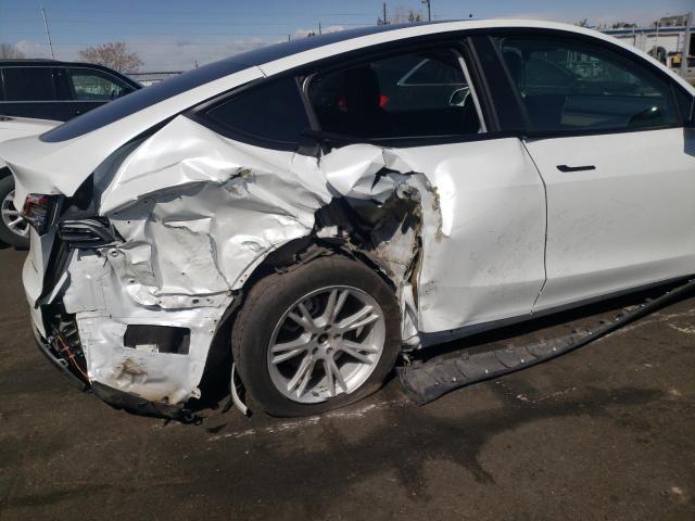 Photo 9 from auction – 2021 TESLA MODEL Y with VIN 5YJYGDEE8MF269381