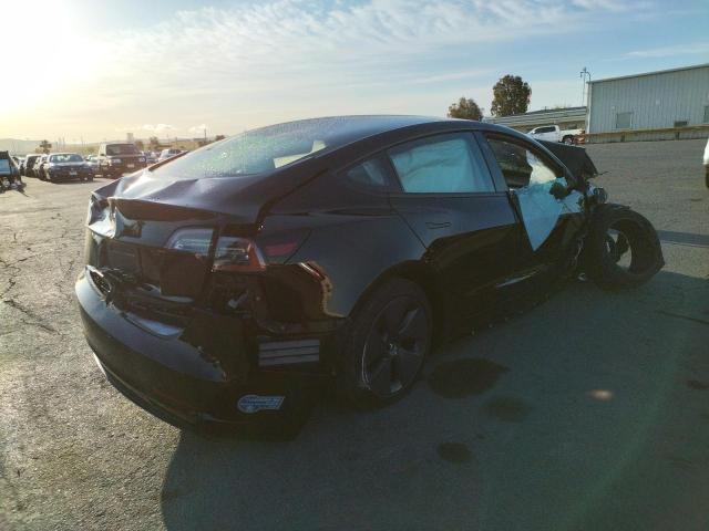 Photo 4 from auction – 2021 TESLA MODEL 3 with VIN 5YJ3E1EA5MF877127