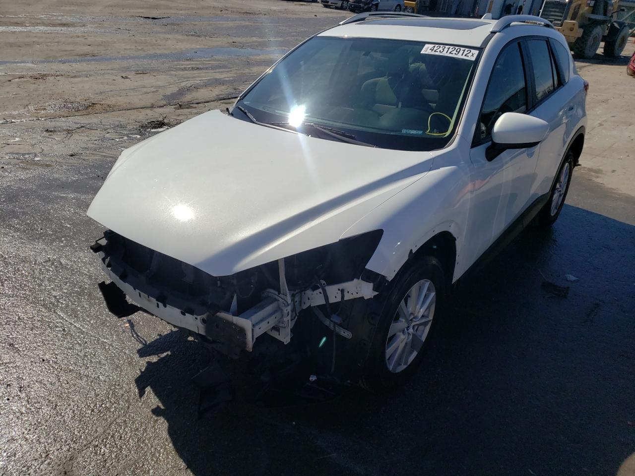 Photo 2 from auction – 2014 MAZDA CX-5 TOURI with VIN JM3KE2CYXE0369468