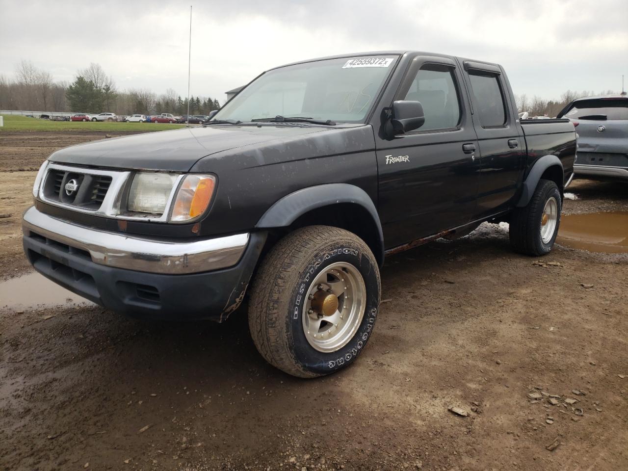 Photo 15 from auction – 2000 NISSAN FRONTIER C with VIN 1N6ED27Y9YC337890