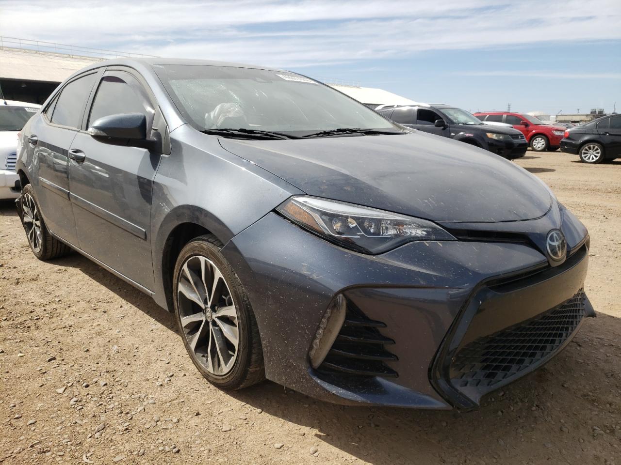 TOYOTA COROLLA L 2017 with VIN 5YFBURHE2HP589569 - Photo from auction