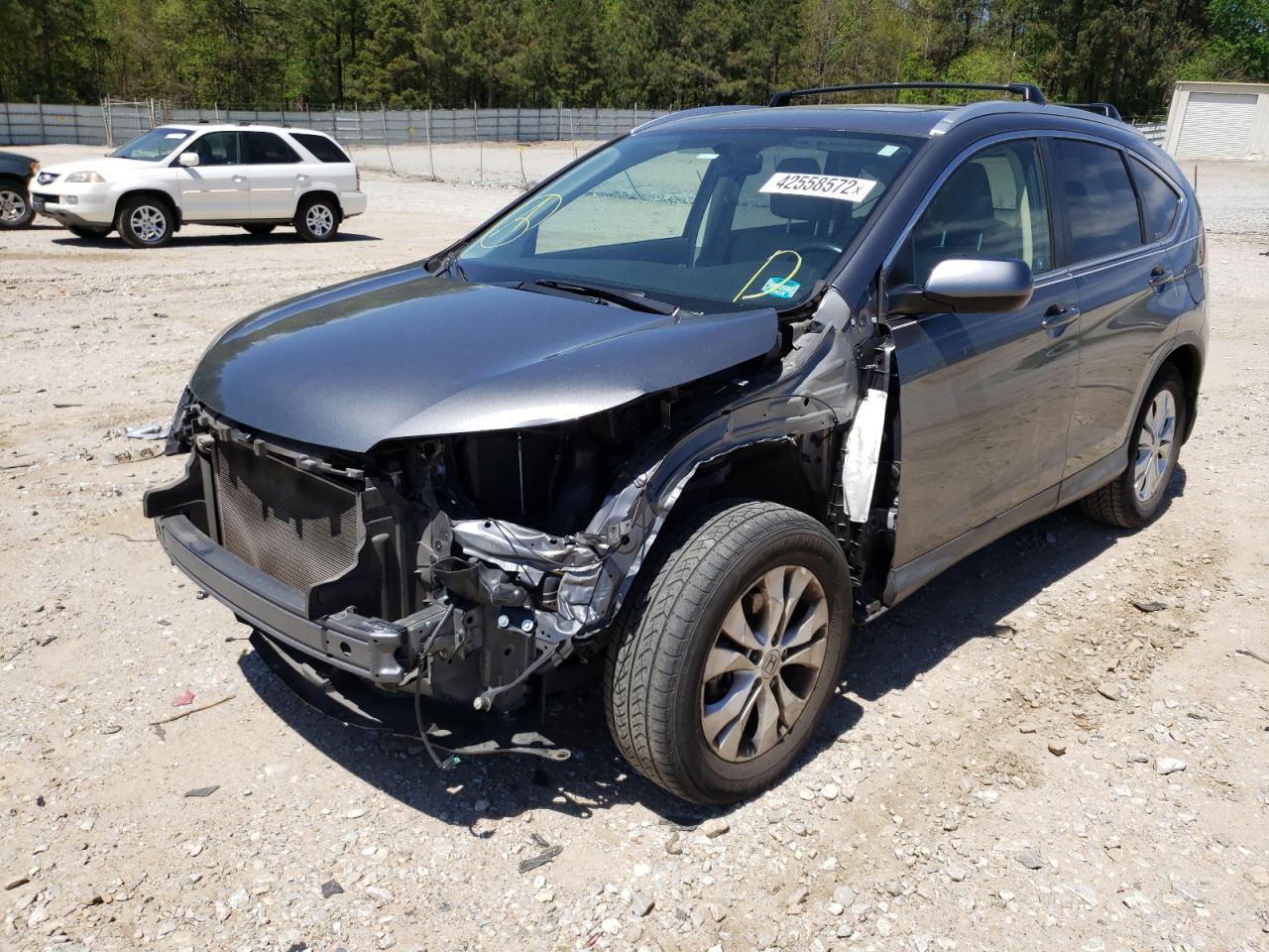 Photo 2 from auction – 2012 HONDA CR-V EXL with VIN JHLRM4H75CC026295