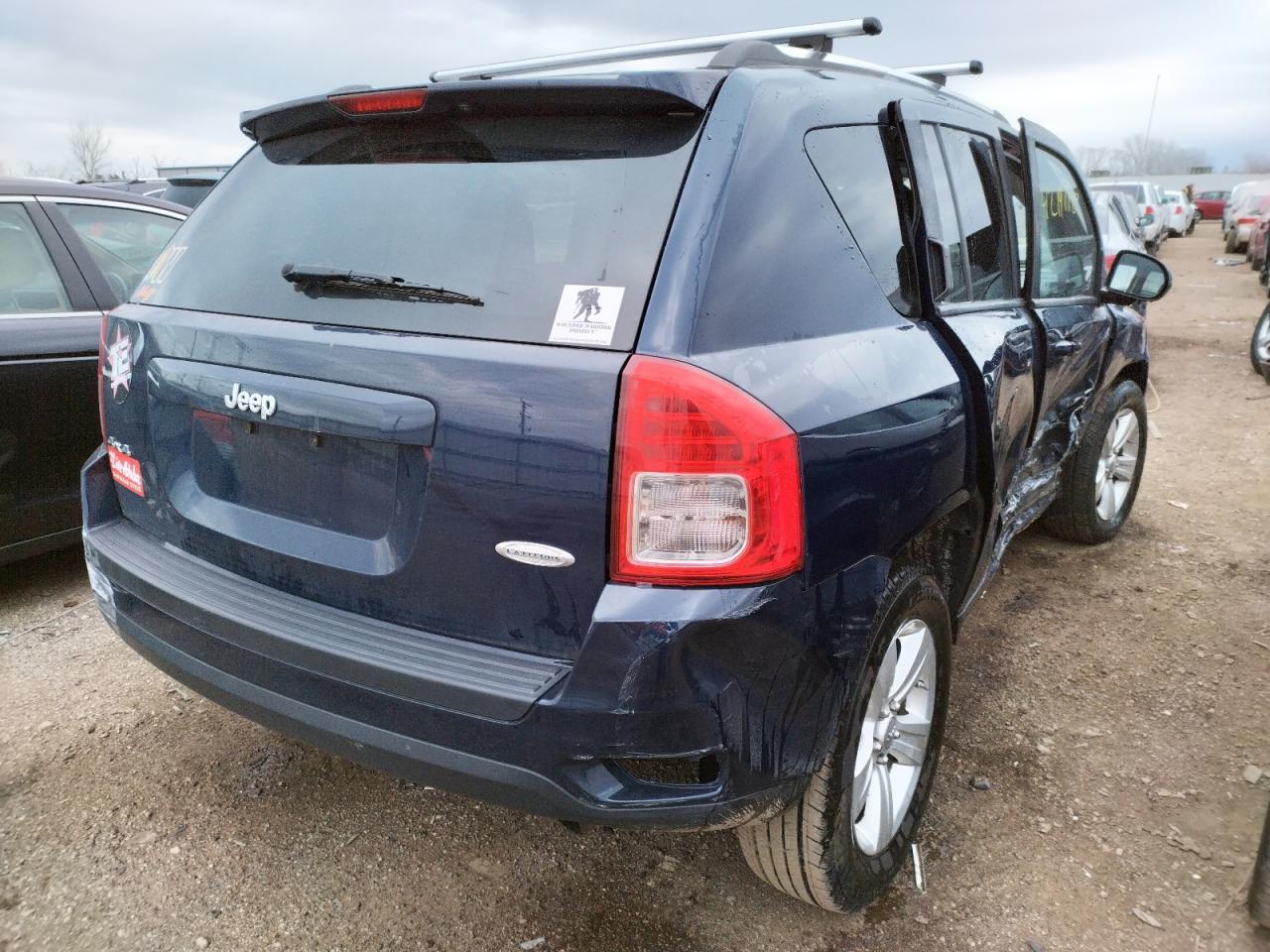 Photo 4 from auction – 2012 JEEP COMPASS LA with VIN 1C4NJDEB2CD633312