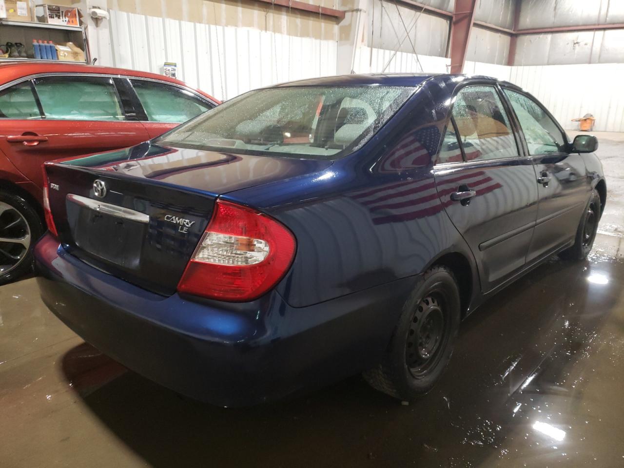 Photo 4 from auction – 2002 TOYOTA CAMRY LE with VIN JTDBE32K220118810