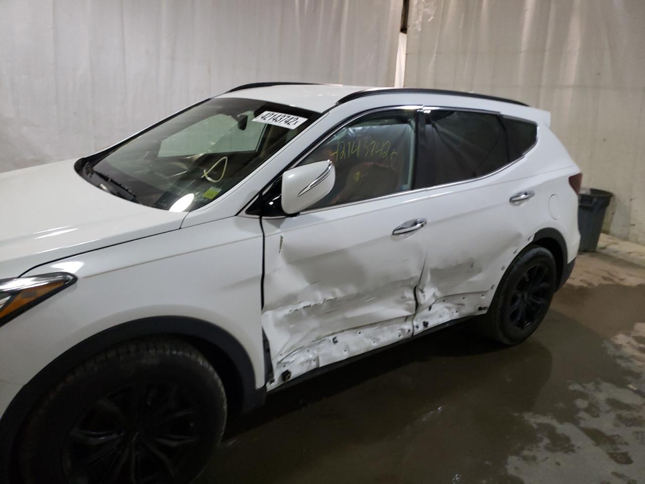 Photo 10 from auction – 2017 HYUNDAI SANTA FE S with VIN 5NMZU3LB7HH031624