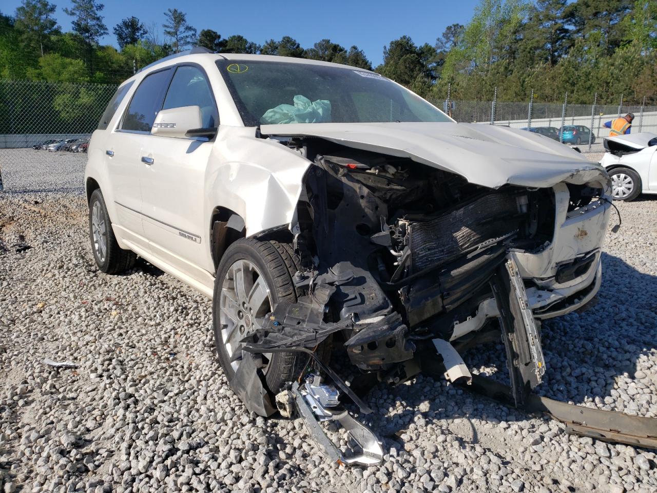 GMC ACADIA DEN 2015 with VIN 1GKKRTKD0FJ160855 - Photo from auction
