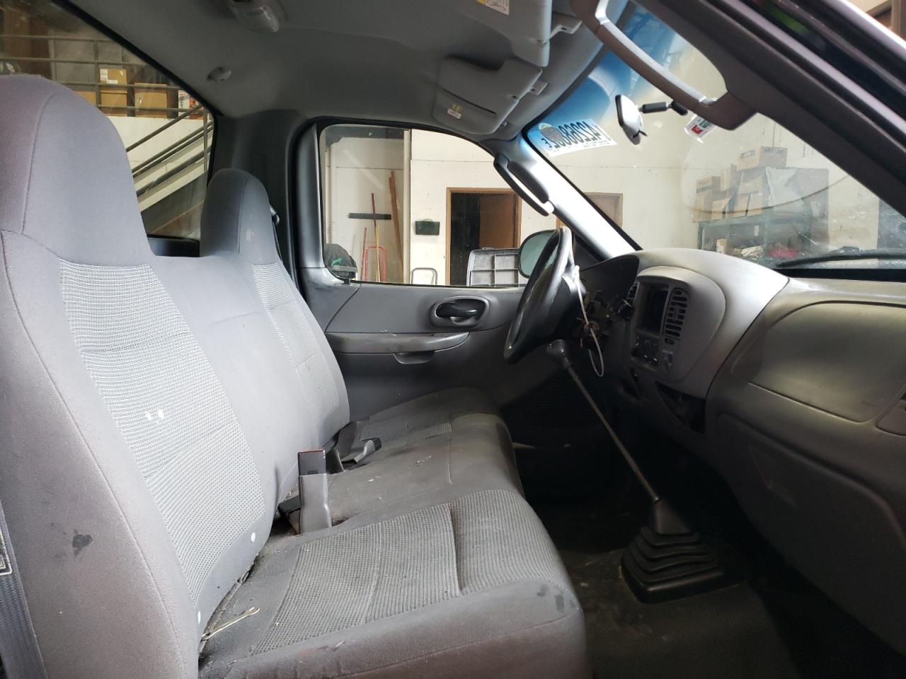 Photo 5 from auction – 2003 FORD F150 with VIN 1FTRF07203KB95958
