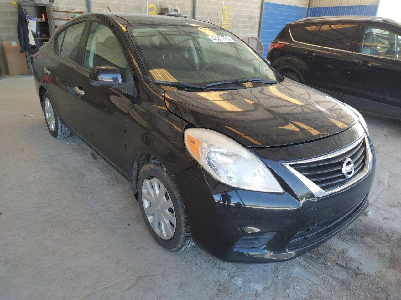 NISSAN VERSA S 2013 with VIN 3N1CN7AP9DL863457 - Photo from auction